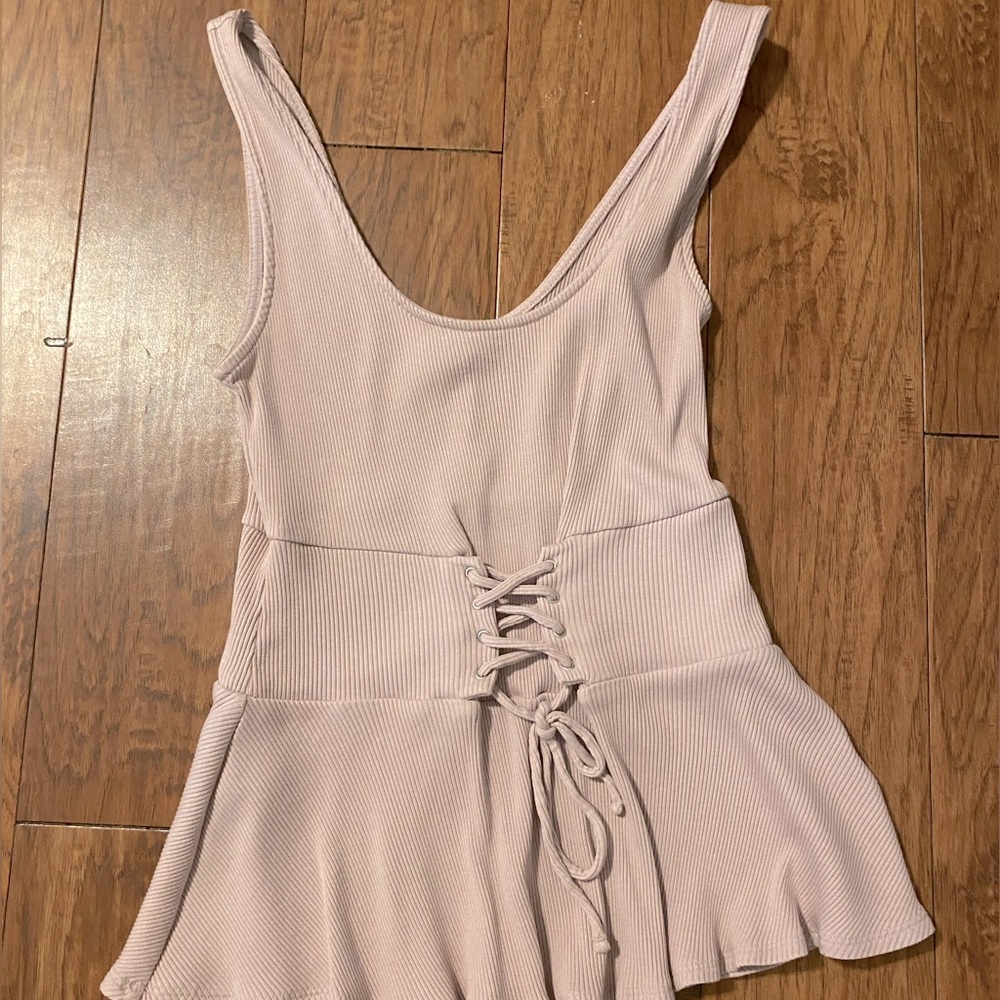 Pale pink peplum tank